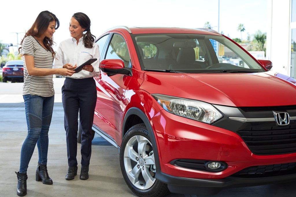 Customer reviewing lease-end options with a Honda of Salisbury specialist